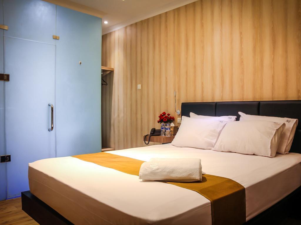 Madu Inn Jakarta Phòng bức ảnh